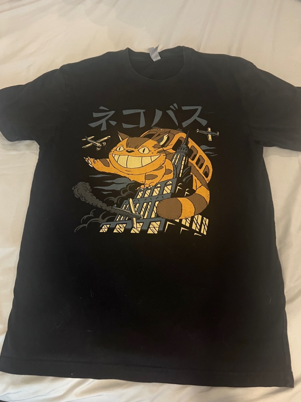 Black Short Sleeve Tee with Orange Cat Bus Graphic